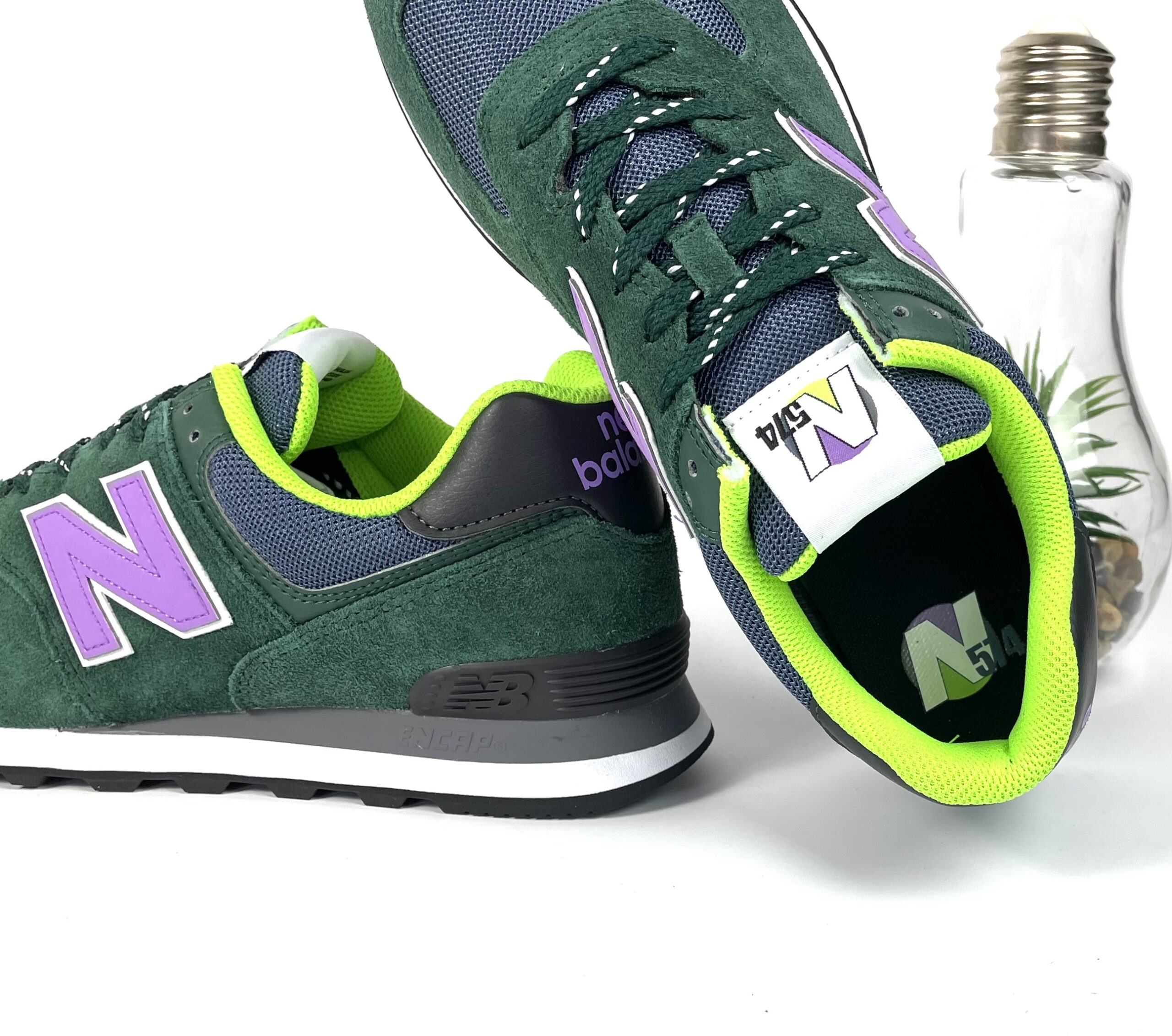 New Balance 574 WH2 Sneaker grun lila meinsportline
