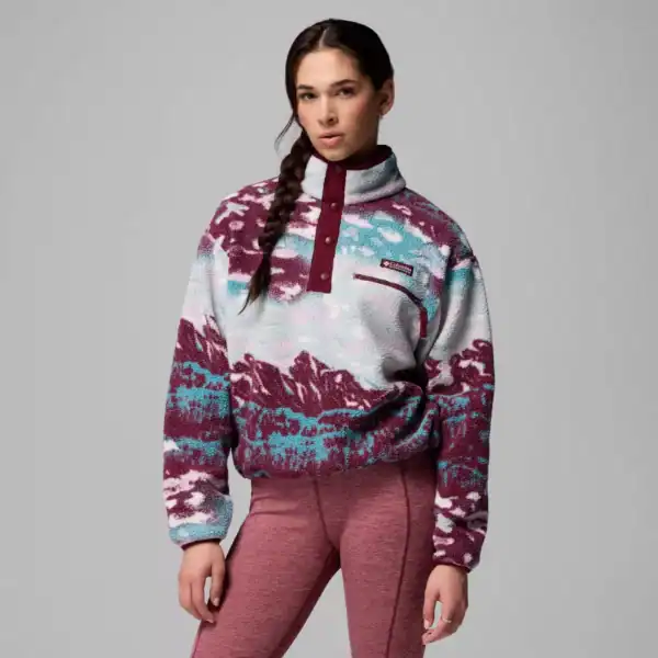Warmer Columbia Fleece Pullover mit Bergmotiv, ideal für Outdoor-Sport und Wintersport, atmungsaktiv und bequem. Perfekt für aktive Damen, die Wert auf Funktionalität und Stil legen.
