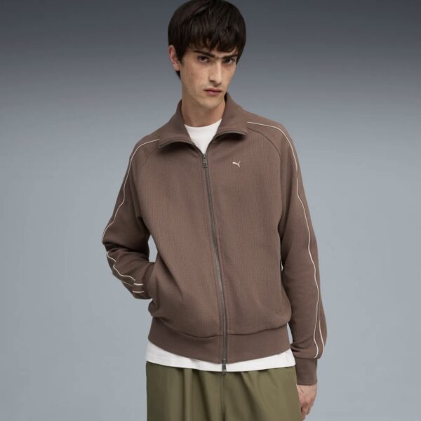 Bequeme Brauntarifzipped Sportsjacke von Puma, geeignet für Sport und Freizeit, stylisch und funktional für aktiven Lifestyle.