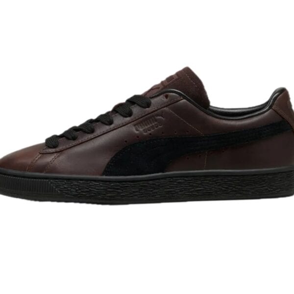 Puma Suede Archiv Sneaker in Dunkelbraun mit schwarzer Sohle und Leder-Details, stilvoll und zeitlos für Herren.